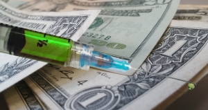 syringe with money